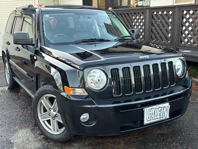 ジープ・パトリオット リミテッド　サンルーフ　ハーフレザーシート　前席シートヒーター　クルーズコントロール　ＥＴＣ　純正ＡＷ　キーレス　フォグ　純正オーディオ　禁煙　ドアバイザー　サイドカメラ（21枚目）