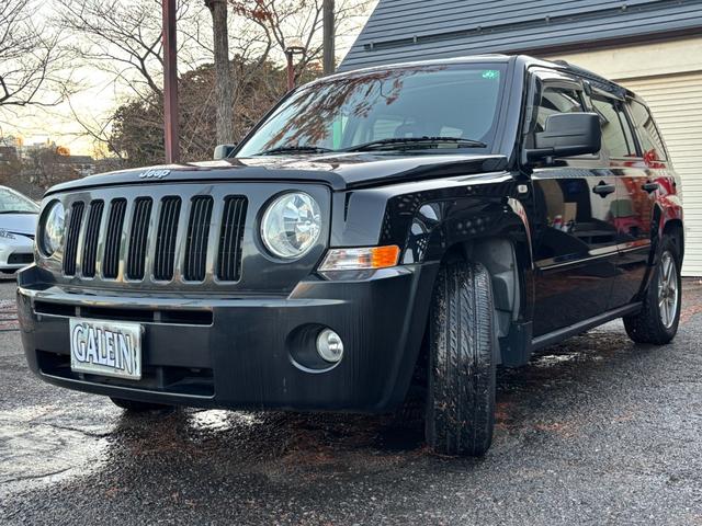 ジープ・パトリオット リミテッド　サンルーフ　ハーフレザーシート　前席シートヒーター　クルーズコントロール　ＥＴＣ　純正ＡＷ　キーレス　フォグ　純正オーディオ　禁煙　ドアバイザー　サイドカメラ（24枚目）