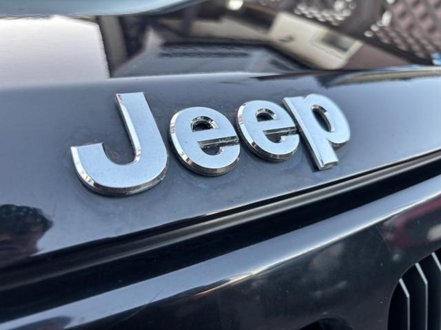 ジープ・パトリオット リミテッド　サンルーフ　ハーフレザーシート　前席シートヒーター　クルーズコントロール　ＥＴＣ　純正ＡＷ　キーレス　フォグ　純正オーディオ　禁煙　ドアバイザー　サイドカメラ（26枚目）