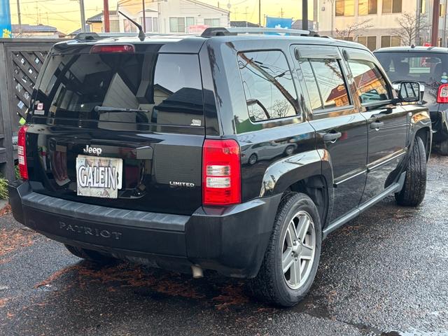 ジープ・パトリオット リミテッド　サンルーフ　ハーフレザーシート　前席シートヒーター　クルーズコントロール　ＥＴＣ　純正ＡＷ　キーレス　フォグ　純正オーディオ　禁煙　ドアバイザー　サイドカメラ（28枚目）