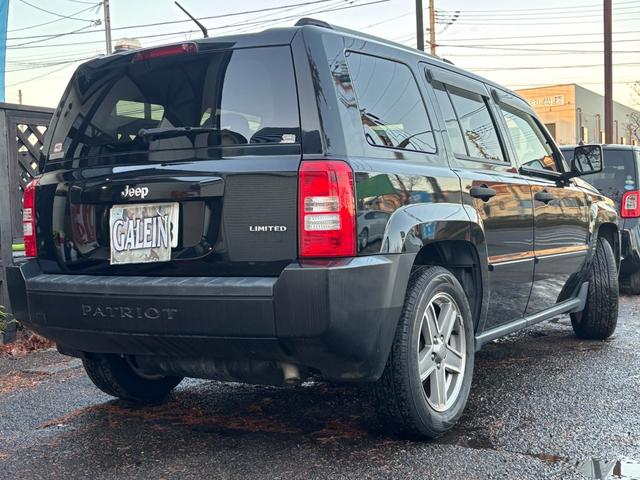 ジープ・パトリオット リミテッド　サンルーフ　ハーフレザーシート　前席シートヒーター　クルーズコントロール　ＥＴＣ　純正ＡＷ　キーレス　フォグ　純正オーディオ　禁煙　ドアバイザー　サイドカメラ（29枚目）