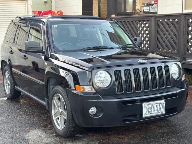 ジープ・パトリオット リミテッド　サンルーフ　ハーフレザーシート　前席シートヒーター　クルーズコントロール　ＥＴＣ　純正ＡＷ　キーレス　フォグ　純正オーディオ　禁煙　ドアバイザー　サイドカメラ（32枚目）