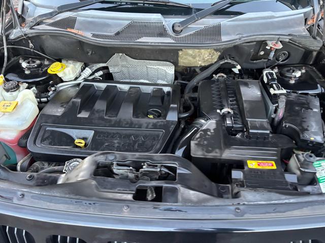 ジープ・パトリオット リミテッド　サンルーフ　ハーフレザーシート　前席シートヒーター　クルーズコントロール　ＥＴＣ　純正ＡＷ　キーレス　フォグ　純正オーディオ　禁煙　ドアバイザー　サイドカメラ（34枚目）