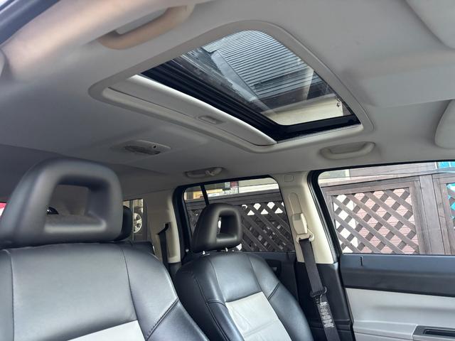 ジープ・パトリオット リミテッド　サンルーフ　ハーフレザーシート　前席シートヒーター　クルーズコントロール　ＥＴＣ　純正ＡＷ　キーレス　フォグ　純正オーディオ　禁煙　ドアバイザー　サイドカメラ（38枚目）