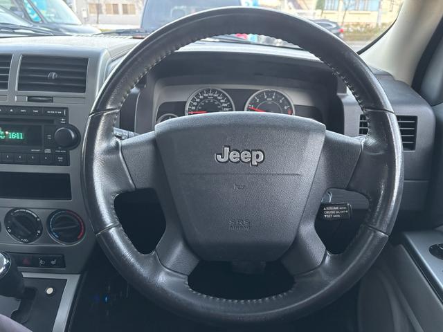 ジープ・パトリオット リミテッド　サンルーフ　ハーフレザーシート　前席シートヒーター　クルーズコントロール　ＥＴＣ　純正ＡＷ　キーレス　フォグ　純正オーディオ　禁煙　ドアバイザー　サイドカメラ（50枚目）