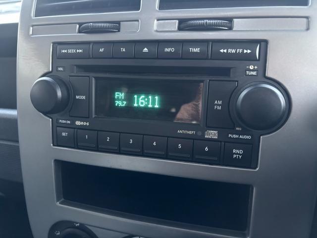 ジープ・パトリオット リミテッド　サンルーフ　ハーフレザーシート　前席シートヒーター　クルーズコントロール　ＥＴＣ　純正ＡＷ　キーレス　フォグ　純正オーディオ　禁煙　ドアバイザー　サイドカメラ（52枚目）