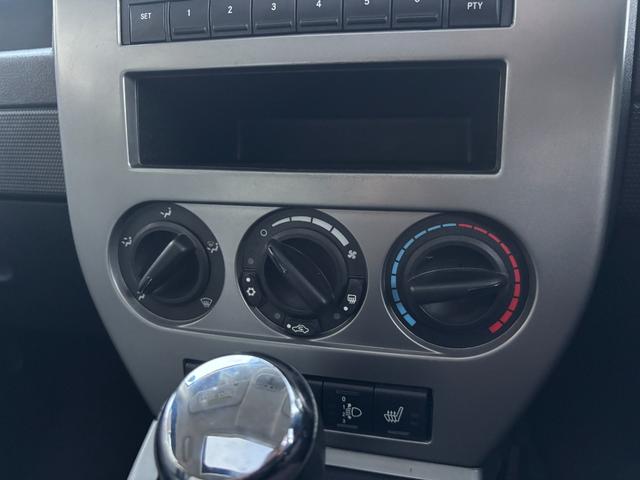 ジープ・パトリオット リミテッド　サンルーフ　ハーフレザーシート　前席シートヒーター　クルーズコントロール　ＥＴＣ　純正ＡＷ　キーレス　フォグ　純正オーディオ　禁煙　ドアバイザー　サイドカメラ（53枚目）