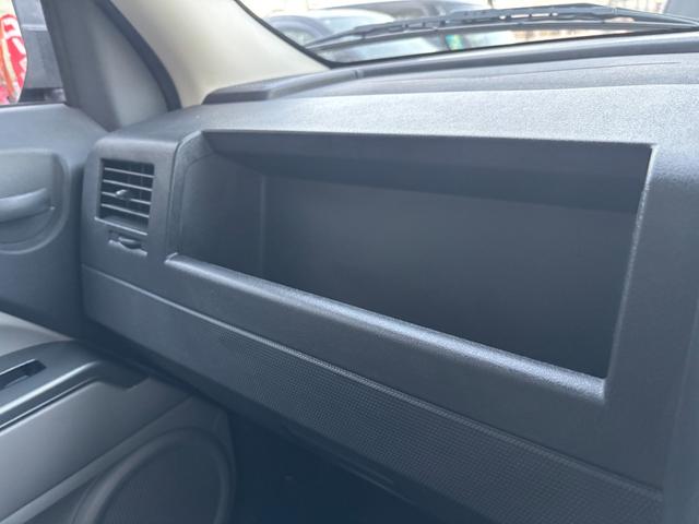 ジープ・パトリオット リミテッド　サンルーフ　ハーフレザーシート　前席シートヒーター　クルーズコントロール　ＥＴＣ　純正ＡＷ　キーレス　フォグ　純正オーディオ　禁煙　ドアバイザー　サイドカメラ（55枚目）