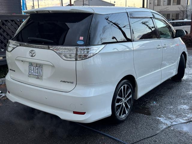 エスティマ アエラス　禁煙　両側パワスラ　Ｄレコ　Ｂｌｕｅｔｏｏｔｈ　ナビ　フルセグ　Ｂカメ　ＥＴＣ　フリップダウンモニター　ＨＩＤ　フォグ　コーナーセンサー　ステアスイッチ　スマキー×２　Ａライト　Ｄバイザー　１８ＡＷ（33枚目）