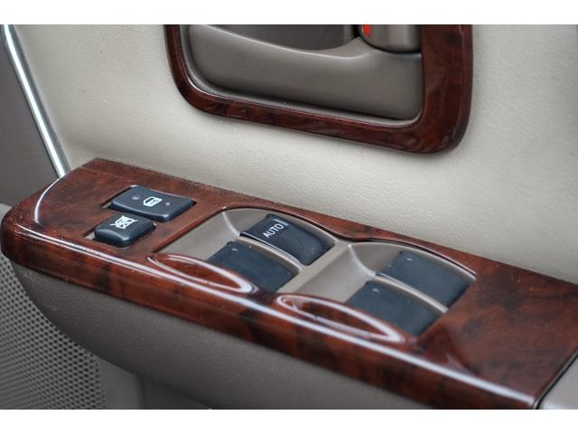 ランドクルーザー80 限定生産台数500台特別仕様車VXリミテッドLパッケージ 3インチリフトアップBFグッドリッジマッドタイヤクリスタルヘッドライトUSコーナーレンズスモークLEDテールガナドールマフラーGD4ソレックスヒッチメンバー社外ナビTVバイパーエンジンスターター(24枚目)