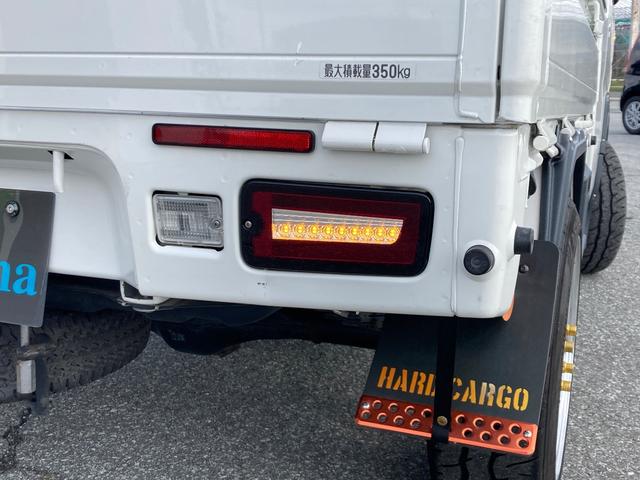 ハイゼットトラック ジャンボ　４ＷＤ　５ＭＴ　バンパーガード　社外ナビ（ＭＡＸ７７５Ｗ）　両側サイドステップ　バックカメラ　リアワイドゲート　ＥＴＣ　ＡＤＶＡＮ　ＲＡＣＩＮＧアルミホイール　オーバーフェンダー　社外テール（9枚目）