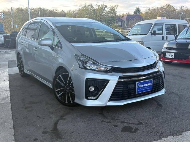 プリウスアルファ Ｓツーリングセレクション・Ｇ’ｓ　社外ナビ　Ｂｌｕｅｔｏｏｔｈ　地デジ　バックカメラ　１８インチ専用アルミ　フリップダウンモニター　専用ハーフレザーシート　バックカメラ　ＥＴＣ　ドラレコ（3枚目）