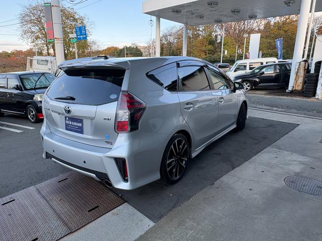 プリウスアルファ Ｓツーリングセレクション・Ｇ’ｓ　社外ナビ　Ｂｌｕｅｔｏｏｔｈ　地デジ　バックカメラ　１８インチ専用アルミ　フリップダウンモニター　専用ハーフレザーシート　バックカメラ　ＥＴＣ　ドラレコ（4枚目）