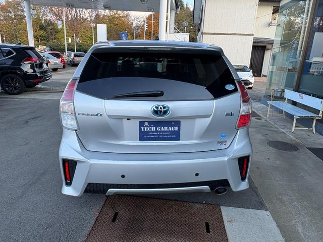 プリウスアルファ Ｓツーリングセレクション・Ｇ’ｓ　社外ナビ　Ｂｌｕｅｔｏｏｔｈ　地デジ　バックカメラ　１８インチ専用アルミ　フリップダウンモニター　専用ハーフレザーシート　バックカメラ　ＥＴＣ　ドラレコ（5枚目）