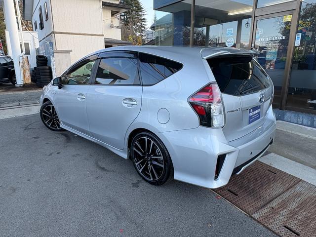 プリウスアルファ Ｓツーリングセレクション・Ｇ’ｓ　社外ナビ　Ｂｌｕｅｔｏｏｔｈ　地デジ　バックカメラ　１８インチ専用アルミ　フリップダウンモニター　専用ハーフレザーシート　バックカメラ　ＥＴＣ　ドラレコ（6枚目）