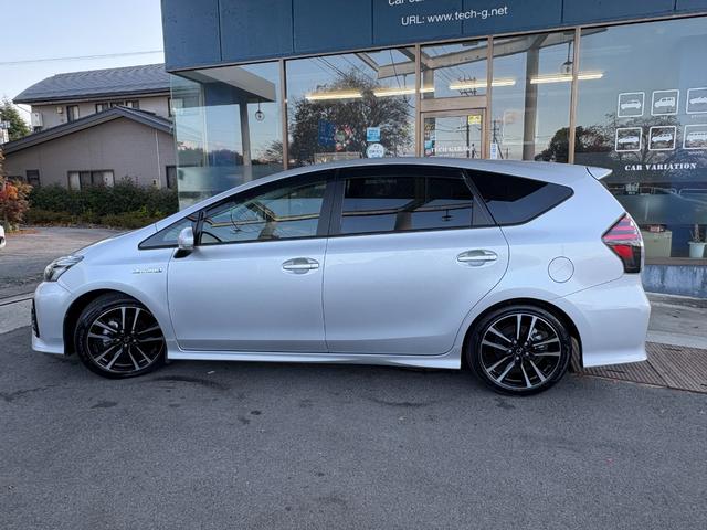 プリウスアルファ Ｓツーリングセレクション・Ｇ’ｓ　社外ナビ　Ｂｌｕｅｔｏｏｔｈ　地デジ　バックカメラ　１８インチ専用アルミ　フリップダウンモニター　専用ハーフレザーシート　バックカメラ　ＥＴＣ　ドラレコ（7枚目）