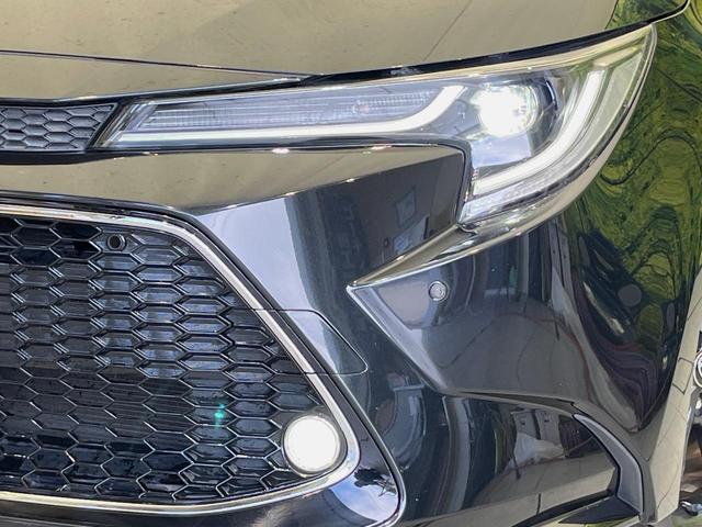 カローラツーリング ハイブリッド ダブルバイビー 9型ディスプレイオーディオ バックカメラ セーフティセンス レーダークルーズ 禁煙車 ハーフレザーシート コーナーセンサー スマートキー LEDヘッド ETC オートハイビーム 純正17インチアルミ(12枚目)