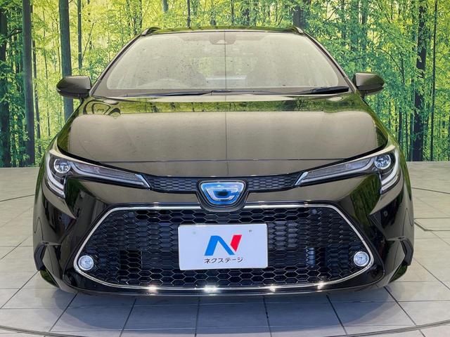 カローラツーリング ハイブリッド ダブルバイビー 9型ディスプレイオーディオ バックカメラ セーフティセンス レーダークルーズ 禁煙車 ハーフレザーシート コーナーセンサー スマートキー LEDヘッド ETC オートハイビーム 純正17インチアルミ(14枚目)