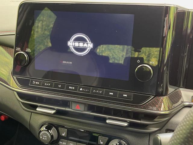 オーラ ニスモ　純正９型ナビ　全周囲カメラ　インテリジェントエマージェンシーブレーキ　レーダークルーズ　禁煙車　２トーンカラー　ハーフレザーシート　シートヒーター　ドラレコ　コーナーセンサー　ＬＥＤヘッド　ＥＴＣ（3枚目）