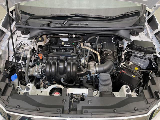 WR-V Z 登録済未使用車 ホンダセンシング レーダークルーズ ハーフレザーシート スマートキー LEDヘッド オートハイビーム 車線逸脱警報 誤発進抑制機能 オートライト オートエアコン 純正17インチAW(18枚目)