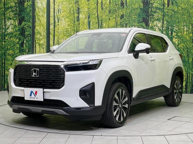 WR-V Z 登録済未使用車 ホンダセンシング レーダークルーズ ハーフレザーシート スマートキー LEDヘッド オートハイビーム 車線逸脱警報 誤発進抑制機能 オートライト オートエアコン 純正17インチAW(24枚目)