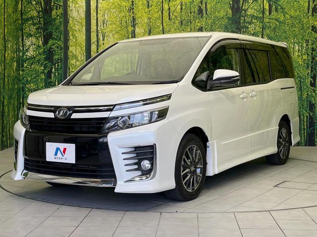 ヴォクシー ＺＳ　両側電動ドア　純正９型ナビ　後席モニター　バックカメラ　セーフティセンス　禁煙車　ドラレコ　スマートキー　ＬＥＤヘッド　ナビ連動ＥＴＣ　車線逸脱警報　純正１６インチＡＷ　オートライト　オートハイビーム（24枚目）