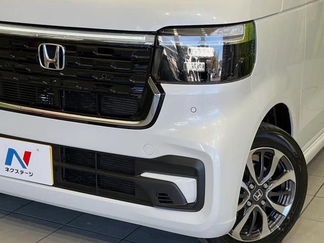 Ｎ－ＢＯＸカスタム ベースグレード　届出済未使用車　両側電動ドア　衝突軽減装置　アダプティブクルーズ　シートヒーター　コーナーセンサー　スマートキー　ＬＥＤヘッドライト　オートハイビーム　車線逸脱警報　誤発進抑制機能　純正１４インチＡＷ（12枚目）