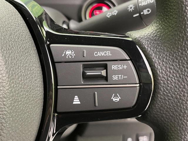 N-BOXカスタム ベースグレード 届出済未使用車 電動スライドドア 衝突軽減装置 アダプティブクルーズ シートヒーター コーナーセンサー スマートキー LEDヘッド オートハイビーム 車線逸脱警報 誤発進抑制機能 純正14インチAW(5枚目)