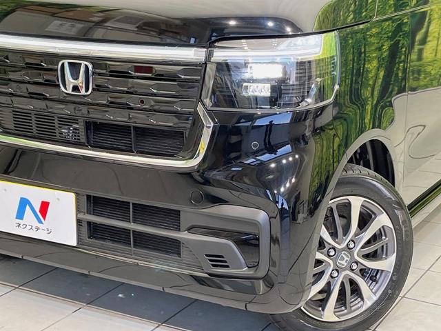 N-BOXカスタム ベースグレード 届出済未使用車 電動スライドドア 衝突軽減装置 アダプティブクルーズ シートヒーター コーナーセンサー スマートキー LEDヘッド オートハイビーム 車線逸脱警報 誤発進抑制機能 純正14インチAW(12枚目)