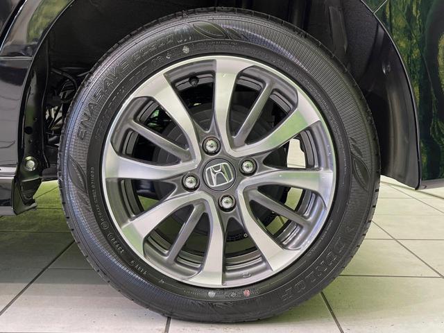 N-BOXカスタム ベースグレード 届出済未使用車 電動スライドドア 衝突軽減装置 アダプティブクルーズ シートヒーター コーナーセンサー スマートキー LEDヘッド オートハイビーム 車線逸脱警報 誤発進抑制機能 純正14インチAW(29枚目)