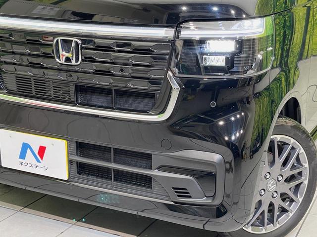 Ｎ－ＢＯＸカスタム ターボ　両側電動ドア　純正８型ナビ　バックカメラ　衝突軽減装置　ハーフレザー　コーナーセンサー　スマートキー　ＬＥＤヘッド　ＥＴＣ　純正１５インチＡＷ　オートハイビーム　車線逸脱警報　誤発進抑制機能（12枚目）