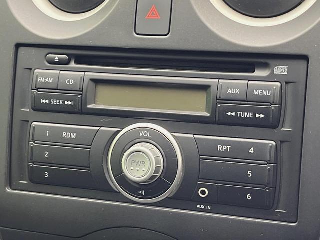 ノート ライダー 禁煙車 スマートキー ETC 純正15インチアルミホイール CD再生 アイドリングストップ 電動格納ミラー 盗難防止システム ドアバイザー パワーウィンドウ パワーステアリング プライバシーガラス(6枚目)