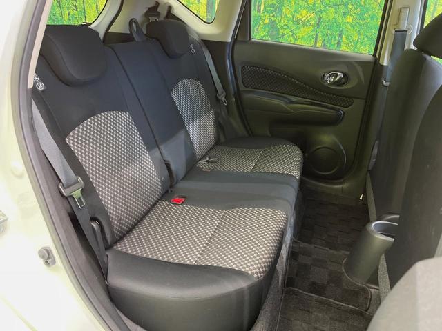 ノート ライダー 禁煙車 スマートキー ETC 純正15インチアルミホイール CD再生 アイドリングストップ 電動格納ミラー 盗難防止システム ドアバイザー パワーウィンドウ パワーステアリング プライバシーガラス(8枚目)