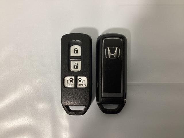 N-BOXカスタム G・Lホンダセンシング 光触媒抗菌消臭施工済 地デジTV 助手席エアバッグ キーレス アイドリングST セキュリティーアラーム スマ-トキ- リアカメラ ナビTV ETC 前車追従機能 サイドエアバッグ LEDヘッドライト(13枚目)