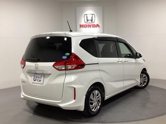 フリード Ｇ・ホンダセンシング　リモコンエンジンスターター付　光触媒抗菌消臭施工済　Ｆセグ　追突被害軽減ブレーキ　ｉストップ　Ｗエアバッグ　パワーウィンドウ　アクティブクルーズコントロール　スマートキ　カラーバックモニター　ＶＳＡ（3枚目）