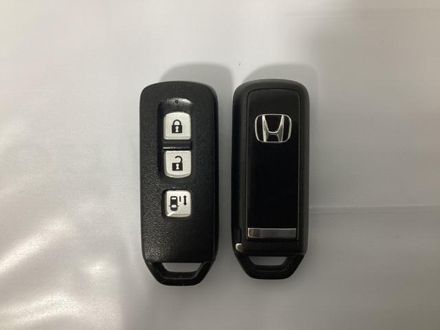 N-BOXカスタム G 光触媒抗菌消臭施工済 Bカメラ アイドリングSTOP スマキー 地デジTV 運転席エアバッグ パワーステアリング パワーウィンドウ ナビTV フルタイム4WD 盗難防止 ETC エアコン DVD再生(12枚目)