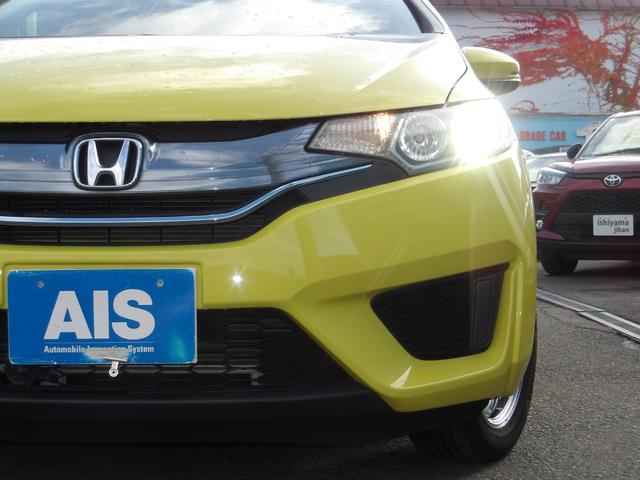 フィットハイブリッド Lパッケージ 4WD 社外SDナビ バックモニター フルセグTV Bluetoothオーディオ ブラックハーフレザーシート 寒冷地仕様 社外アルミホイール 純正ホイール組スタッドレス有(6枚目)