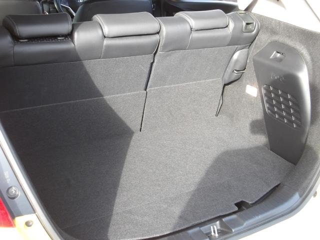 フィットハイブリッド Lパッケージ 4WD 社外SDナビ バックモニター フルセグTV Bluetoothオーディオ ブラックハーフレザーシート 寒冷地仕様 社外アルミホイール 純正ホイール組スタッドレス有(24枚目)