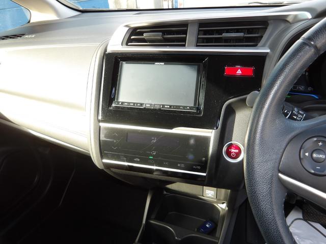 フィットハイブリッド Lパッケージ 4WD 社外SDナビ バックモニター フルセグTV Bluetoothオーディオ ブラックハーフレザーシート 寒冷地仕様 社外アルミホイール 純正ホイール組スタッドレス有(37枚目)