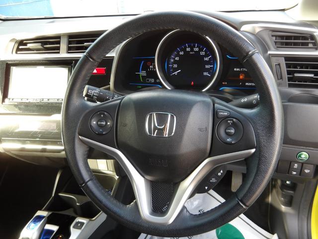 フィットハイブリッド Lパッケージ 4WD 社外SDナビ バックモニター フルセグTV Bluetoothオーディオ ブラックハーフレザーシート 寒冷地仕様 社外アルミホイール 純正ホイール組スタッドレス有(43枚目)