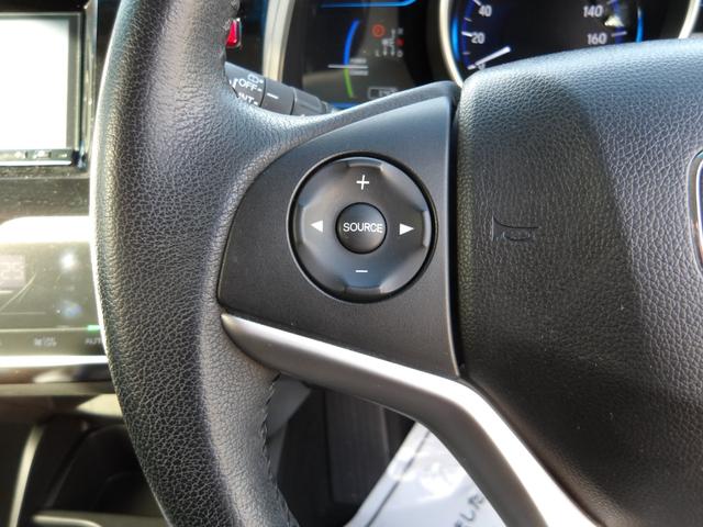 フィットハイブリッド Lパッケージ 4WD 社外SDナビ バックモニター フルセグTV Bluetoothオーディオ ブラックハーフレザーシート 寒冷地仕様 社外アルミホイール 純正ホイール組スタッドレス有(44枚目)