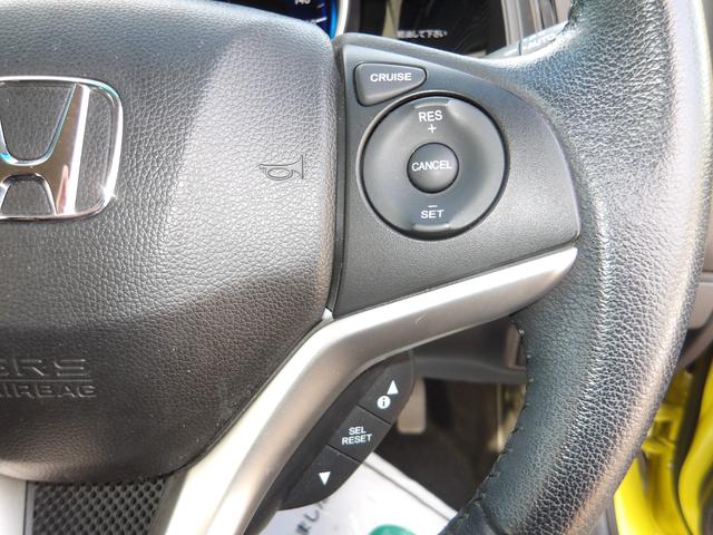 フィットハイブリッド Lパッケージ 4WD 社外SDナビ バックモニター フルセグTV Bluetoothオーディオ ブラックハーフレザーシート 寒冷地仕様 社外アルミホイール 純正ホイール組スタッドレス有(45枚目)