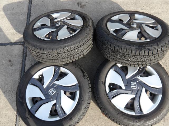 フィットハイブリッド Lパッケージ 4WD 社外SDナビ バックモニター フルセグTV Bluetoothオーディオ ブラックハーフレザーシート 寒冷地仕様 社外アルミホイール 純正ホイール組スタッドレス有(49枚目)