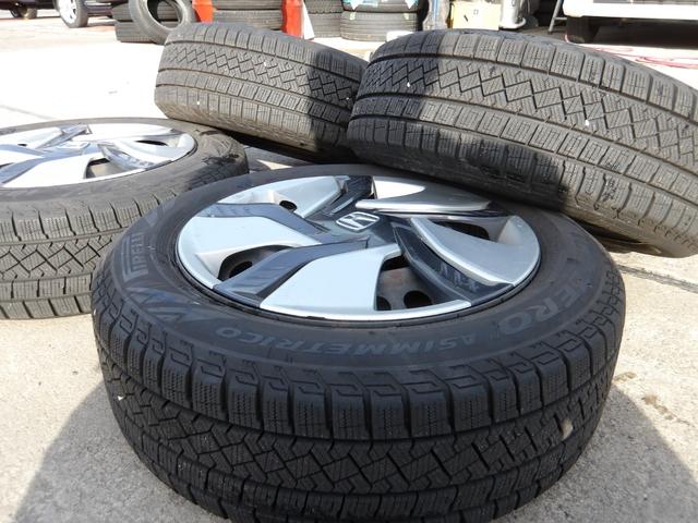 フィットハイブリッド Lパッケージ 4WD 社外SDナビ バックモニター フルセグTV Bluetoothオーディオ ブラックハーフレザーシート 寒冷地仕様 社外アルミホイール 純正ホイール組スタッドレス有(50枚目)