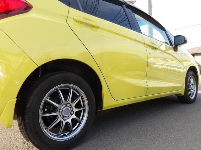 フィットハイブリッド Lパッケージ 4WD 社外SDナビ バックモニター フルセグTV Bluetoothオーディオ ブラックハーフレザーシート 寒冷地仕様 社外アルミホイール 純正ホイール組スタッドレス有(59枚目)