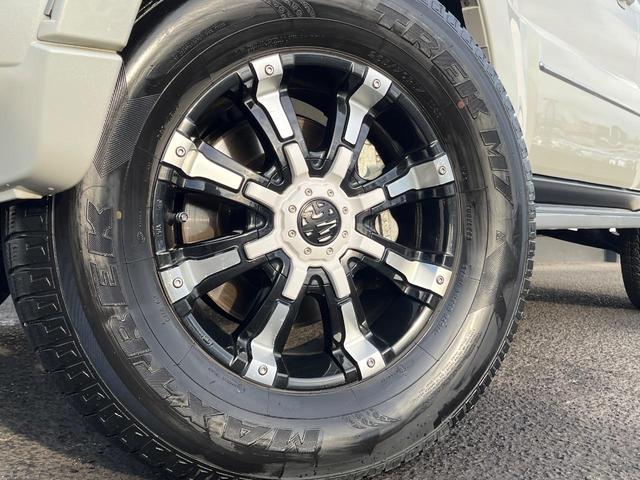 パジェロ ロング スーパーエクシード 4WD 7人乗り 禁煙車 純正7インチナビ 本革シート バックカメラ ETC Bluetooth フルセグ 前席シートヒーター 前席パワーシート HIDヘッドライト LEDフォグライト クルコン(14枚目)