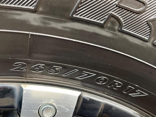 パジェロ ロング スーパーエクシード 4WD 7人乗り 禁煙車 純正7インチナビ 本革シート バックカメラ ETC Bluetooth フルセグ 前席シートヒーター 前席パワーシート HIDヘッドライト LEDフォグライト クルコン(28枚目)