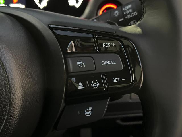 ヴェゼル ｅ：ＨＥＶ　Ｚ　登録済未使用車　衝突被害軽減システム　純正９インチナビ　全周囲カメラ　ＥＴＣ　電動リアゲート　ハーフレザーシート　ＬＥＤヘッド　コーナーセンサー　スマートキー　純正１８インチアルミ　オートハイビーム（6枚目）