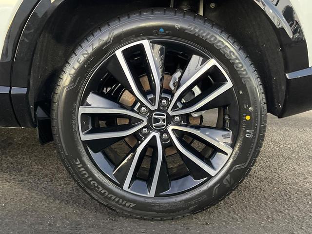 ヴェゼル ｅ：ＨＥＶ　Ｚ　登録済未使用車　衝突被害軽減システム　純正９インチナビ　全周囲カメラ　ＥＴＣ　電動リアゲート　ハーフレザーシート　ＬＥＤヘッド　コーナーセンサー　スマートキー　純正１８インチアルミ　オートハイビーム（31枚目）