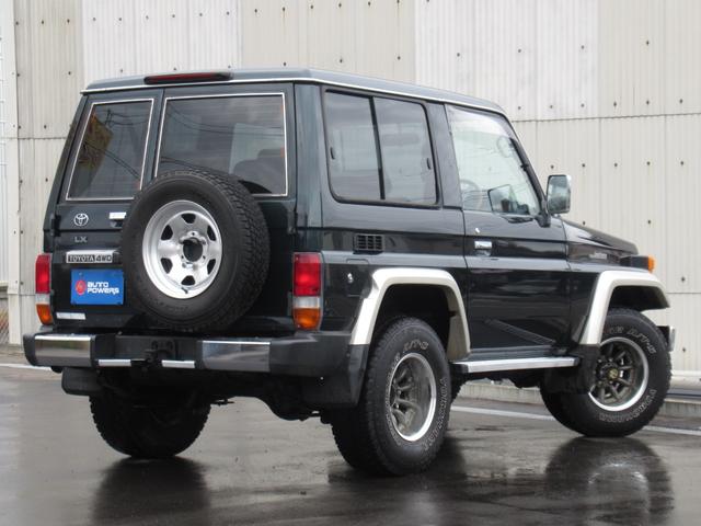 ランドクルーザー70 LXショートナローボディー 5速マニュアル 前後リーフ型 マニュアルハブ メッキバンパー 社外15インチアルミホイール ヨコハマジオランダーA/T・S 純正ダークグリーン色 ケンウッドSDナビ フルセグテレビ Bluetooth(7枚目)